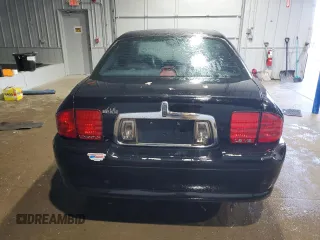 2002 Lincoln LS w/Base Pkg with VIN 1LNHM87A52Y714212, listed as a Copart auction lot 84810774 with 68,413 mi miles and Salvage Title. Bid and sale history available at DreamBid. Image 6.