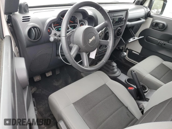 2010 Jeep Wrangler Sport with VIN 1J4AA2D12AL130050, listed as a Copart auction lot 54736025 with 48,262 mi miles and Salvage Title. Bid and sale history available at carsss.com. Image 8.