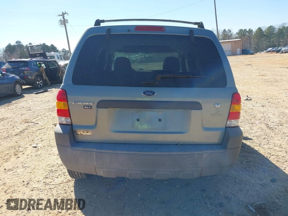 2007 Ford Escape XLT with VIN 1FMCU03137KB28362, listed as a IAAI auction lot 41689766 with 154,345 mi miles and . Bid and sale history available at DreamBid. Image 16.