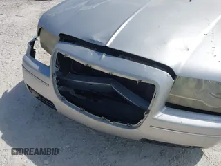 2006 Chrysler 300 Touring z VIN 2C3KA53G86H109231, wystawiony jako IAAI lot #42299031 z przebiegiem Nie podano mil oraz . Historia ofert i sprzedaży dostępna na DreamBid. Obrazek 6.