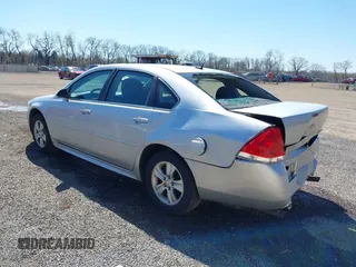 2014 Chevrolet Impala LS with VIN 2G1WA5E39E1153813, listed as a IAAI auction lot 42062409 with 343,418 mi miles and . Bid and sale history available at DreamBid. Image 3.