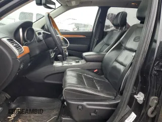 2013 Jeep Grand Cherokee Overland with VIN 1C4RJFCT9DC615096, listed as a Copart auction lot 86817074 with 112,421 mi miles and Salvage Title. Bid and sale history available at carsss.com. Image 7.