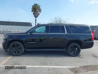 2020 Chevrolet Suburban LT with VIN 1GNSCHKC2LR229759, listed as a IAAI auction lot 42128257 with 46,138 mi miles and . Bid and sale history available at DreamBid. Image 14.