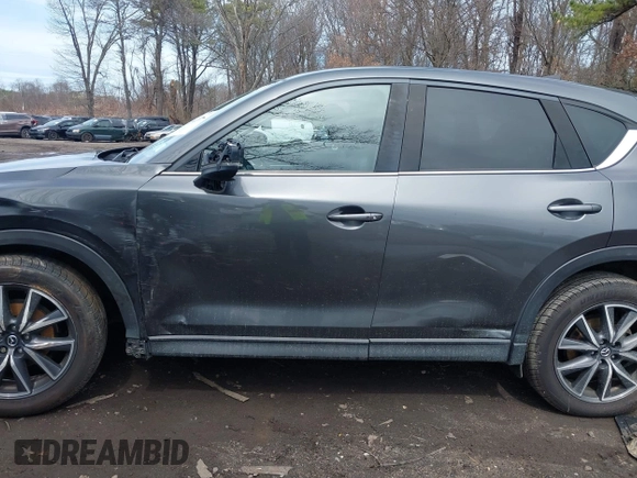 2018 Mazda CX-5 Grand Touring with VIN JM3KFBDM6J0388540, listed as a IAAI auction lot 41963726 with 103,148 mi miles. Bid and sale history available at carsss.com. Image 14.
