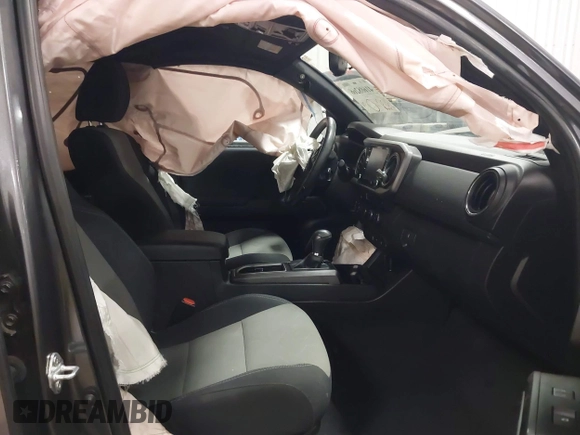 2021 Toyota Tacoma SR z VIN 5TFCZ5AN1MX268854, wystawiony jako IAAI lot #41608266 z przebiegiem 45 823 mil mil oraz . Historia ofert i sprzedaży dostępna na DreamBid. Obrazek 5.