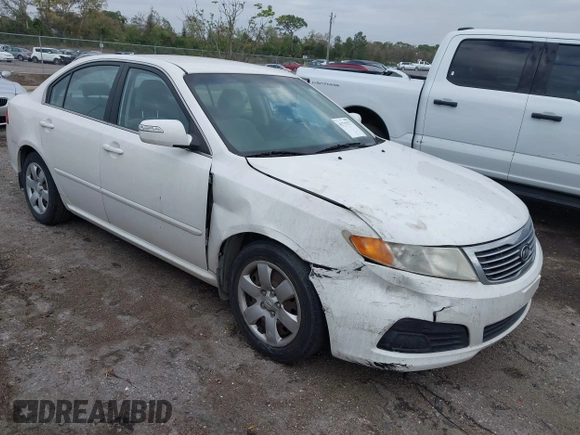 2009 Kia Optima LX z VIN KNAGE228395333286, wystawiony jako IAAI lot #41737577 z przebiegiem 113 152 mil mil oraz . Historia ofert i sprzedaży dostępna na DreamBid. Obrazek 1.
