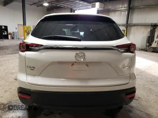 2023 Mazda CX-9 Touring Plus with VIN JM3TCBAY4P0653310, listed as a Copart auction lot 42734995 with 18,236 mi miles and Salvage title. Bid and sale history available at DreamBid. Image 6.
