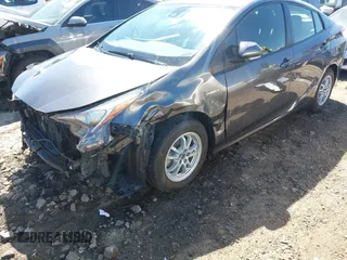 2017 Toyota Prius Two with VIN JTDKBRFU4H3036656, listed as a IAAI auction lot 41823354 with 59,233 mi miles and . Bid and sale history available at carsss.com. Image 6.