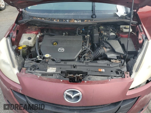 2012 Mazda 5 Sport with VIN JM1CW2BL4C0110696, listed as a Copart auction lot 58699865 with 201,603 mi miles and Salvage title. Bid and sale history available at DreamBid. Image 12.