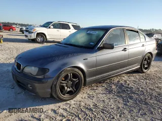 2003 BMW 3 Series 330i with VIN WBAEV53413KM02697, listed as a Copart auction lot 76511414 with 177,293 mi miles and Salvage Title. Bid and sale history available at carsss.com. Image 1.