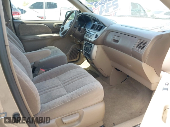 2002 Toyota Sienna LE with VIN 4T3ZF13CX2U500604, listed as a IAAI auction lot 41959768 with 139,668 mi miles. Bid and sale history available at carsss.com. Image 5.