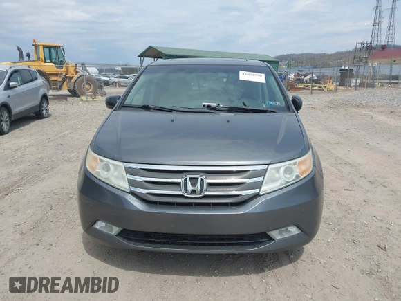 2012 Honda Odyssey Touring with VIN 5FNRL5H90CB045430, listed as a IAAI auction lot 42079770 with 113,901 mi miles and . Bid and sale history available at DreamBid. Image 13.