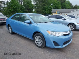 2012 Toyota Camry L z VIN 4T4BF1FKXCR249474, wystawiony jako IAAI lot #42287473 z przebiegiem 100 320 mil mil oraz . Historia ofert i sprzedaży dostępna na DreamBid. Obrazek 1.