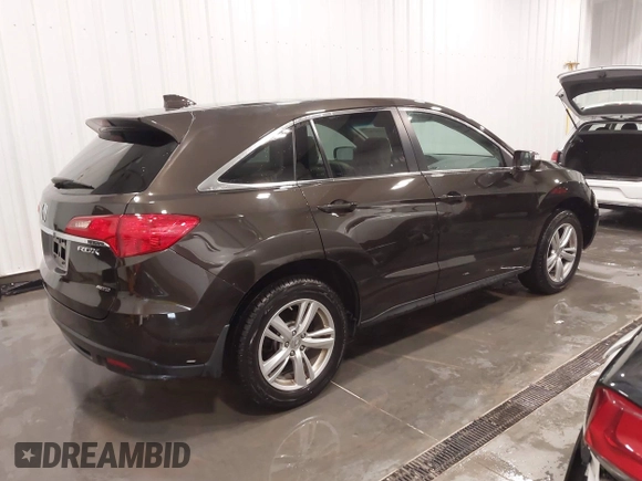 2014 Acura RDX z VIN 5J8TB4H31EL013702, wystawiony jako IAAI lot #42027828 z przebiegiem 70 761 mil mil oraz . Historia ofert i sprzedaży dostępna na DreamBid. Obrazek 4.