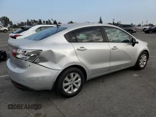 2014 Kia Rio EX z VIN KNADN4A30E6353469, wystawiony jako Copart lot #43788955 z przebiegiem 156 096 mil mil oraz Szkoda całkowita • Salvage title. Historia ofert i sprzedaży dostępna na DreamBid. Obrazek 3.