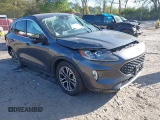 2020 Ford Escape Titanium Hybrid with VIN 1FMCU9DZ2LUA86600, listed as a IAAI auction lot 42059830 with 76,998 mi miles and . Bid and sale history available at DreamBid. Image 1.