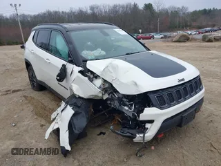 2019 Jeep Compass Trailhawk z VIN 3C4NJDDB5KT671630, wystawiony jako IAAI lot #41907634 z przebiegiem 80 488 mil mil oraz . Historia ofert i sprzedaży dostępna na DreamBid. Obrazek 1.