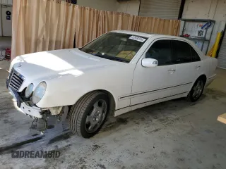 2002 Mercedes-Benz E-Class with VIN WDBJF70J82B449047, listed as a Copart auction lot 82839314 with 170,710 mi miles and Salvage Title. Bid and sale history available at carsss.com. Image 1.