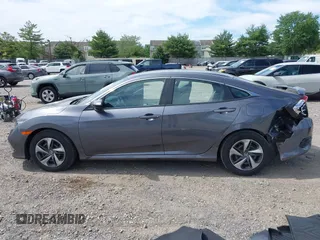2021 Honda Civic LX with VIN 2HGFC2F65MH525423, listed as a IAAI auction lot 42319862 with 37,248 mi miles and . Bid and sale history available at DreamBid. Image 14.
