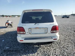 2006 Lexus LX 470 z VIN JTJHT00W864007291, wystawiony jako Copart lot #57331555 z przebiegiem 142 194 mil mil oraz Szkody całkowita. Historia ofert i sprzedaży dostępna na DreamBid. Obrazek 6.