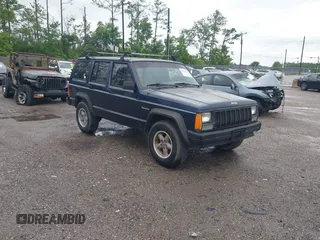 1996 Jeep Cherokee SE z VIN 1J4FJ28S5TL129065, wystawiony jako IAAI lot #42231133 z przebiegiem 225 320 mil mil oraz . Historia ofert i sprzedaży dostępna na DreamBid. Obrazek 1.