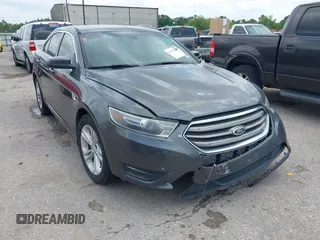 2015 Ford Taurus SEL with VIN 1FAHP2E8XFG153631, listed as a IAAI auction lot 42101348 with 211,381 mi miles and . Bid and sale history available at carsss.com. Image 1.