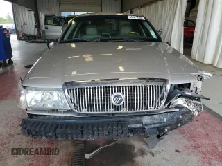2005 Mercury Grand Marquis LS Premium z VIN 2MEHM75W85X650957, wystawiony jako Copart lot #56677604 z przebiegiem 163 446 mil mil oraz Szkoda całkowita • Salvage title. Historia ofert i sprzedaży dostępna na DreamBid. Obrazek 5.