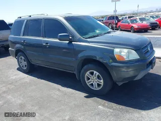 2004 Honda Pilot EX with VIN 2HKYF18514H623272, listed as a IAAI auction lot 42020669 with 186,766 mi miles. Bid and sale history available at carsss.com. Image 1.