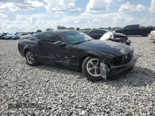 2005 Ford Mustang GT Deluxe с VIN 1ZVHT82H955140714, выставлен на аукционе Copart как лот 63867025 с пробегом 93 237 миль миль и Списание • Salvage title. История ставок и продаж доступна на DreamBid. Изображение 4.