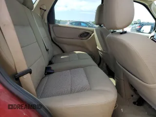 2006 Ford Escape XLT z VIN 1FMCU93136KA12761, wystawiony jako Copart lot #65526955 z przebiegiem 142 075 mil mil oraz Szkoda całkowita • Salvage title. Historia ofert i sprzedaży dostępna na DreamBid. Obrazek 11.