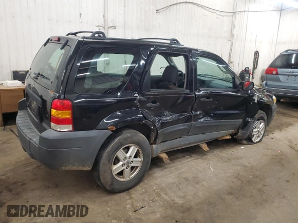 2005 Ford Escape XLS Value with VIN 1FMYU92Z05DA10448, listed as a Copart auction lot 54438955 with 185,303 mi miles and Salvage title. Bid and sale history available at DreamBid. Image 3.