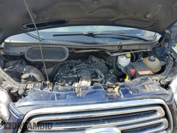 2018 Ford Transit Passenger XL z VIN 1FBZX2YG2JKB39878, wystawiony jako Copart lot #54557905 z przebiegiem 132 974 mil mil oraz Szkoda całkowita • Salvage title. Historia ofert i sprzedaży dostępna na DreamBid. Obrazek 12.