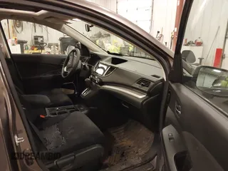 2015 Honda CR-V EX with VIN 2HKRM4H56FH670649, listed as a IAAI auction lot 42007616 with 142,353 mi miles and . Bid and sale history available at DreamBid. Image 5.