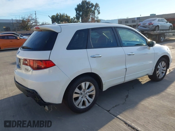 2012 Acura RDX Tech Pkg with VIN 5J8TB2H55CA000305, listed as a IAAI auction lot 41293627 with 209,566 mi miles. Bid and sale history available at carsss.com. Image 4.