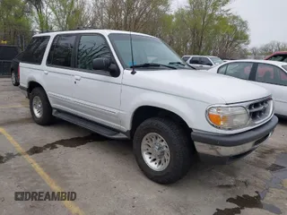 1998 Ford Explorer XL z VIN 1FMZU34E0WZB57112, wystawiony jako IAAI lot #41939205 z przebiegiem 171 982 mil mil oraz . Historia ofert i sprzedaży dostępna na DreamBid. Obrazek 1.