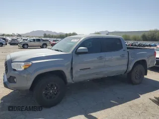 2020 Toyota Tacoma SR5 with VIN 3TMAZ5CN3LM120083, listed as a Copart auction lot 61831755 with 87,946 mi miles and Salvage title. Bid and sale history available at DreamBid. Image 1.