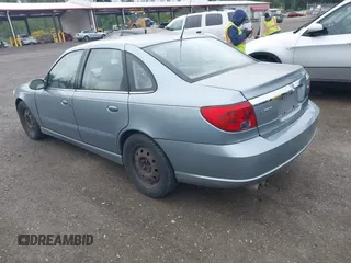 2003 Saturn LS z VIN 1G8JW54R03Y573151, wystawiony jako IAAI lot #42281639 z przebiegiem 137 501 mil mil oraz . Historia ofert i sprzedaży dostępna na DreamBid. Obrazek 3.