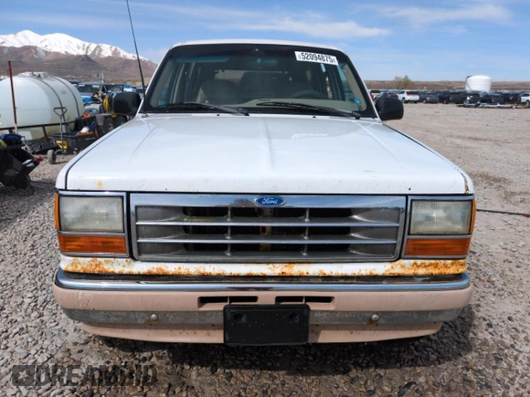 1992 Ford Explorer Eddie Bauer with VIN 1FMDU34X2NUE11927, listed as a Copart auction lot 52094875 with 53,449 mi miles and Salvage title. Bid and sale history available at DreamBid. Image 5.