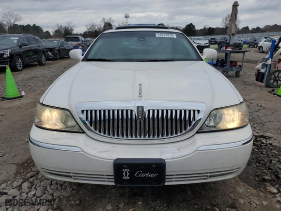 2003 Lincoln Town Car Cartier with VIN 1LNHM83W63Y604904, listed as a Copart auction lot 44057875 with 184,007 mi miles and Salvage Title. Bid and sale history available at carsss.com. Image 5.