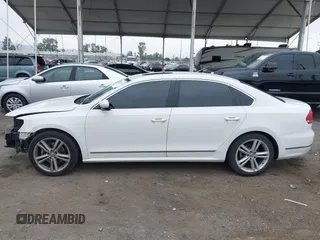 2015 Volkswagen Passat 1.8T SE w/Sunroof & Nav with VIN 1VWBT7A31FC043798, listed as a IAAI auction lot 42108289 with 132,442 mi miles. Bid and sale history available at carsss.com. Image 15.
