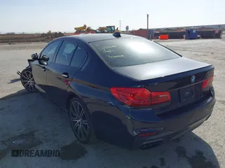 2018 BMW 5 Series M550i xDrive with VIN WBAJB9C55JB286036, listed as a IAAI auction lot 41738640 with 79,049 mi miles and . Bid and sale history available at DreamBid. Image 3.