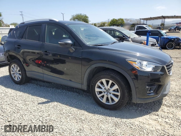 2016 Mazda CX-5 Touring with VIN JM3KE4CY2G0867484, listed as a Copart auction lot 54545435 with 100,664 mi miles and Salvage Title. Bid and sale history available at carsss.com. Image 4.