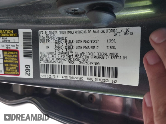 2018 Toyota Tacoma SR5 z VIN 3TMAZ5CN0JM077058, wystawiony jako IAAI lot #41685472 z przebiegiem 37 945 mil mil oraz . Historia ofert i sprzedaży dostępna na DreamBid. Obrazek 9.