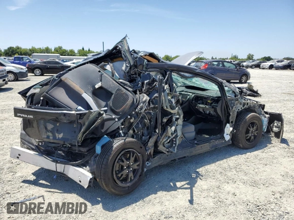 2013 Toyota Prius One z VIN JTDKN3DU7D0345945, wystawiony jako Copart lot #57703325 z przebiegiem Nie podano mil oraz Szkoda całkowita • Salvage title. Historia ofert i sprzedaży dostępna na DreamBid. Obrazek 3.