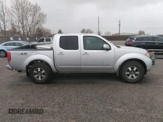 2011 Nissan Frontier Pro-4X with VIN 1N6AD0EV2BC438370, listed as a IAAI auction lot 41952484 with 217,529 mi miles and . Bid and sale history available at DreamBid. Image 13.