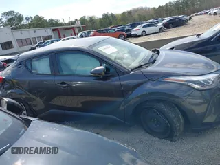 2021 Toyota C-HR LE with VIN NMTKHMBX3MR128835, listed as a IAAI auction lot 41891619 with 57,744 mi miles and . Bid and sale history available at DreamBid. Image 13.