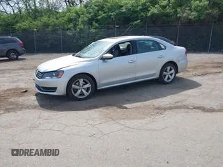 2012 Volkswagen Passat SE with VIN 1VWBP7A32CC101143, listed as a IAAI auction lot 42124955 with 64,843 mi miles. Bid and sale history available at carsss.com. Image 2.