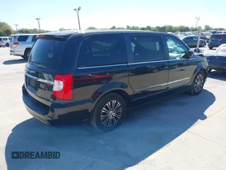2014 Chrysler Town & Country S with VIN 2C4RC1HG1ER304229, listed as a IAAI auction lot 41807902 with 139,266 mi miles. Bid and sale history available at carsss.com. Image 4.