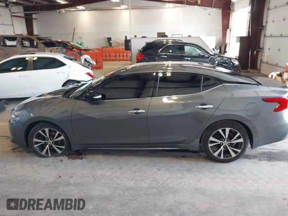 2017 Nissan Maxima SV with VIN 1N4AA6AP1HC427784, listed as a IAAI auction lot 41533604 with 111,295 mi miles and . Bid and sale history available at DreamBid. Image 14.