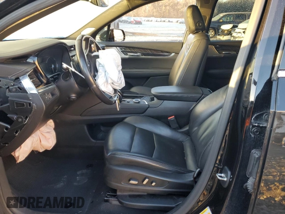 2023 Cadillac XT6 FWD Premium Luxury z VIN 1GYKPCRS7PZ105628, wystawiony jako Copart lot #84841124 z przebiegiem Nie podano mil oraz Szkoda całkowita • Salvage title. Historia ofert i sprzedaży dostępna na DreamBid. Obrazek 7.